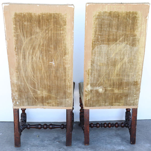 Two English Jacobean Walnut and Flemish Tapestry Upholstered Hall Chairs
