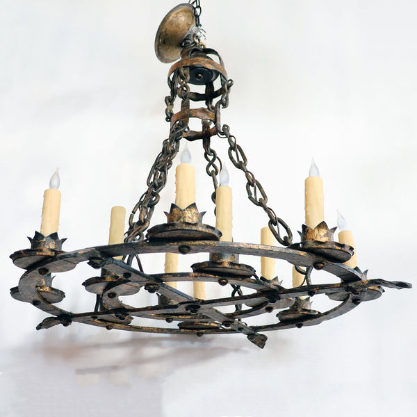 Pair of Large Medieval Style Gilt Forged Iron 12-Light Chandeliers