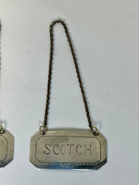 Set of Two American Sterling Silver Rye and Scotch Decanter Labels