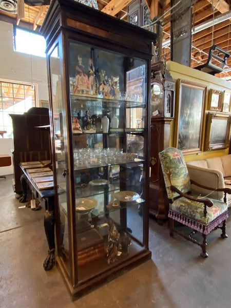 Lot 213 | Anglo Indian Teak, Mirrored and Beveled Glass Tall Narrow Display Cabinet