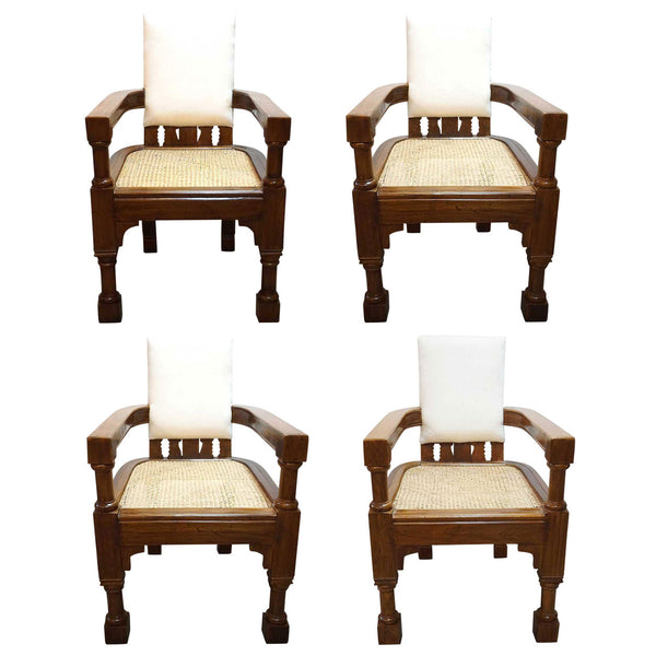 Lot 0317 | Four Anglo Indian Minerva Furniture Works Eastlake Caned Inlaid Teak Upholstered Armchairs