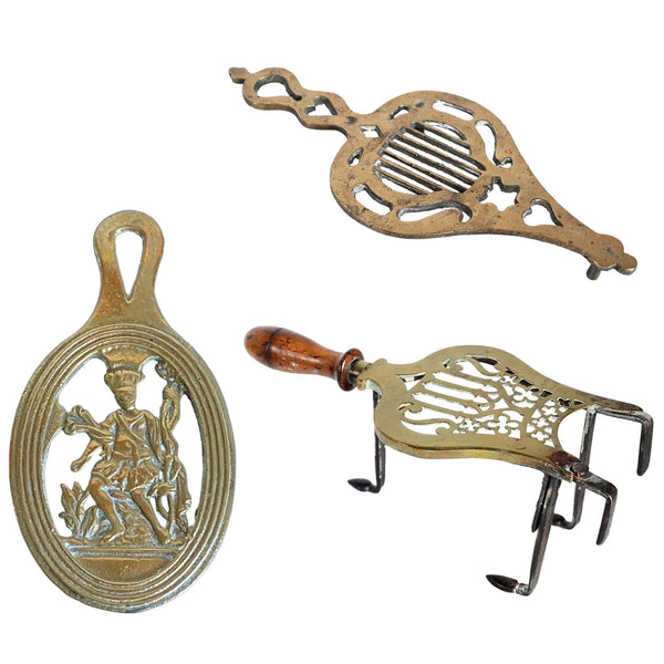 Lot 0413 | English Victorian Reticulated Brass Flat Iron Trivets (3)