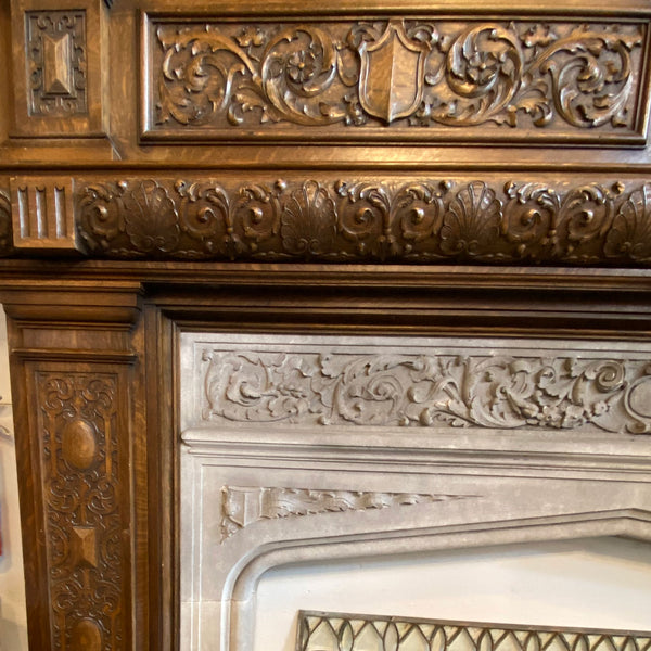 American Jacobean Revival Oak and Limestone Trumeau Fireplace Surround