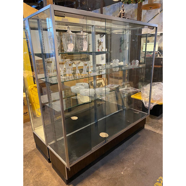 Lot 0532 | Large Aluminum, Mirror and Glass 70-inch Sliding Display Case