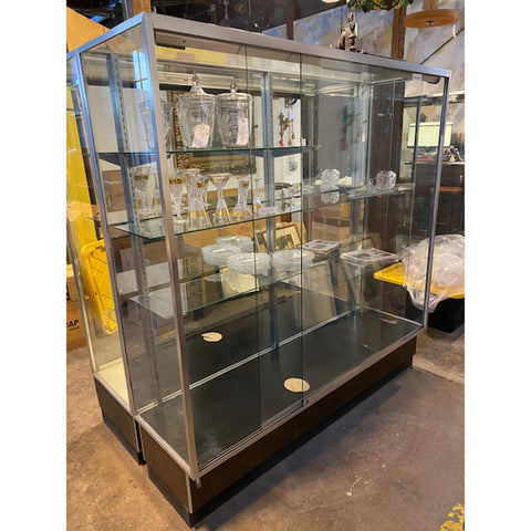 Lot 0532 | Large Aluminum, Mirror and Glass 70-inch Sliding Display Case