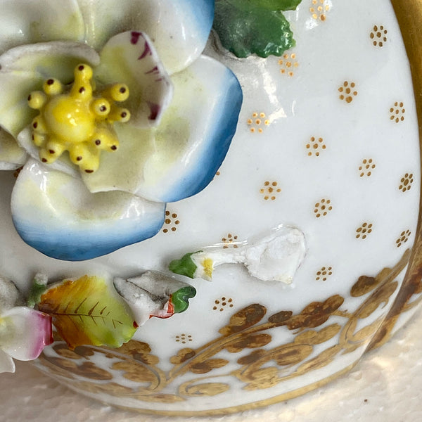 Pair of English Porcelain Floral Encrusted Bottle Vases