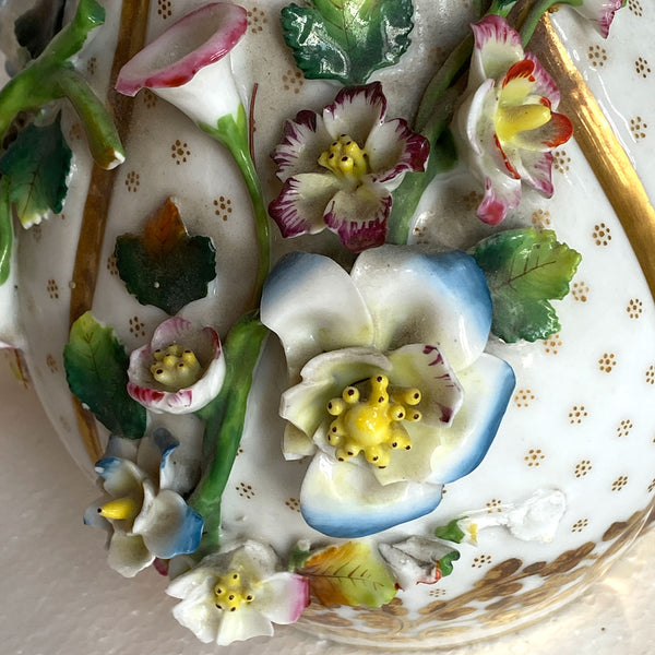 Pair of English Porcelain Floral Encrusted Bottle Vases