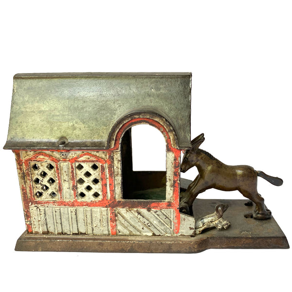 American J. & E. Stevens Painted Cast Iron Mule Entering Barn Mechanical Bank