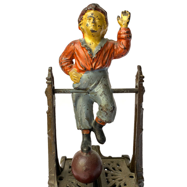 American J. Barton Smith Co. Painted Cast Iron Boy on Trapeze Mechanical Bank