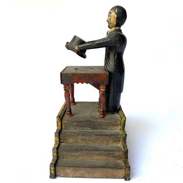 American J. & E. Stevens Painted Cast Iron Magician Mechanical Bank