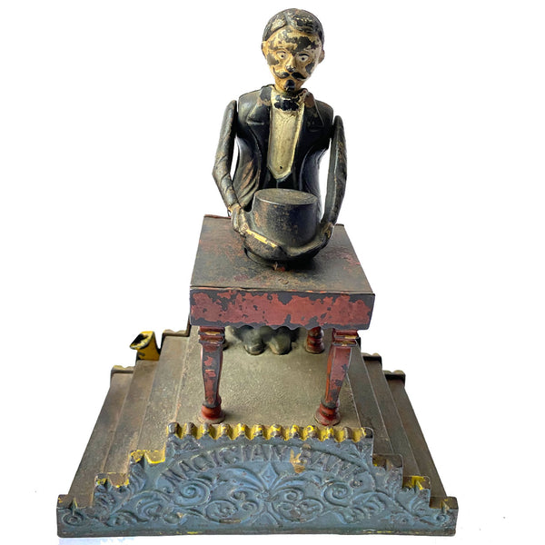 American J. & E. Stevens Painted Cast Iron Magician Mechanical Bank