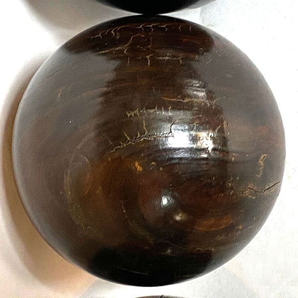 Collection of Four Scottish and English Lignum Vitae Lawn Bowls