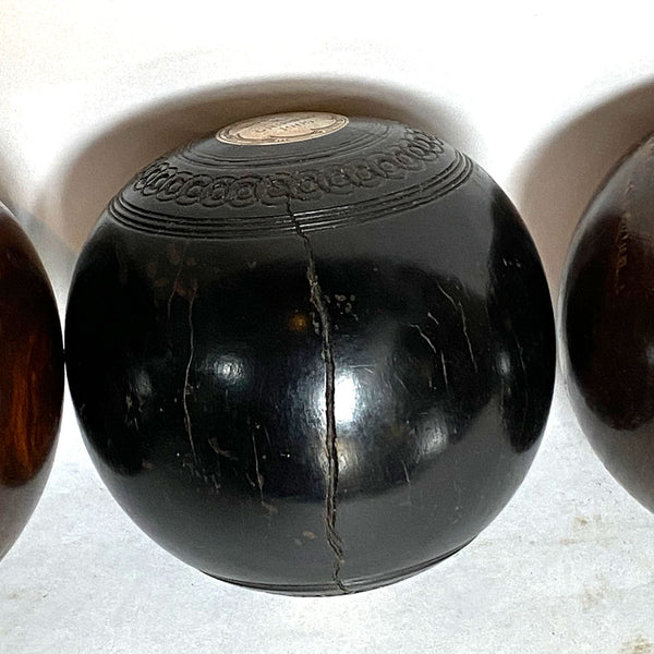 Collection of Four Scottish and English Lignum Vitae Lawn Bowls