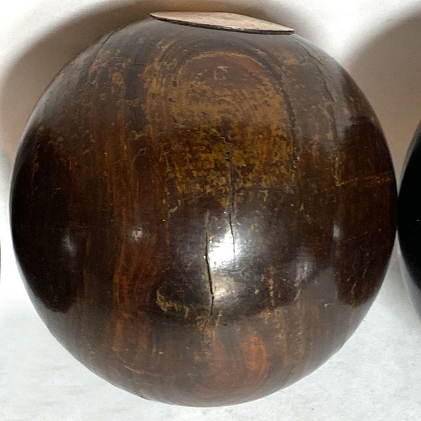 Collection of Four Scottish and English Lignum Vitae Lawn Bowls