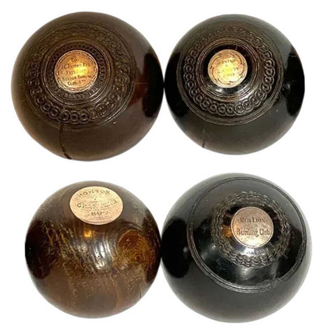Collection of Four Scottish Thomas Taylor and English Lignum Vitae Lawn Balls