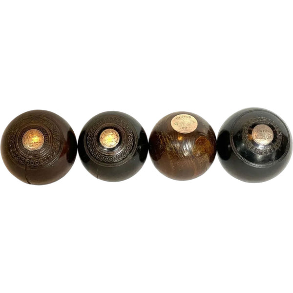 Collection of Four Scottish and English Lignum Vitae Lawn Bowls