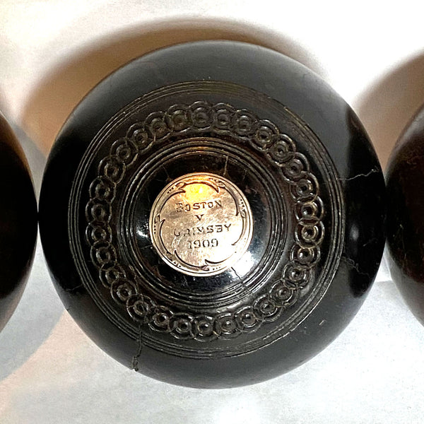 Collection of Four Scottish and English Lignum Vitae Lawn Bowls