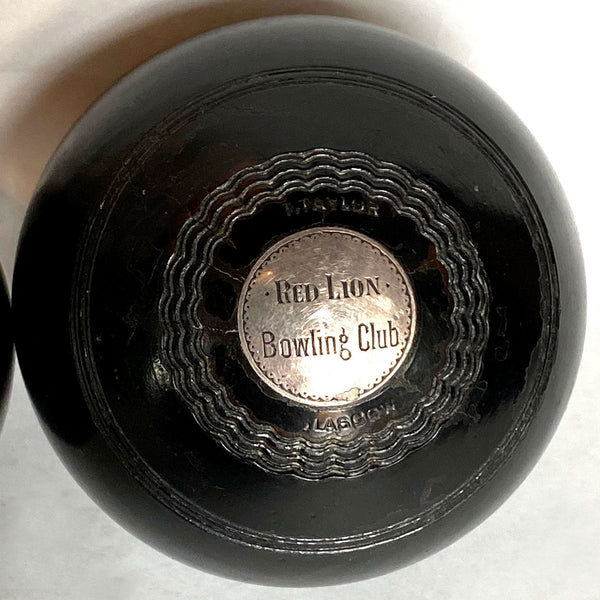 Collection of Four Scottish and English Lignum Vitae Lawn Bowls