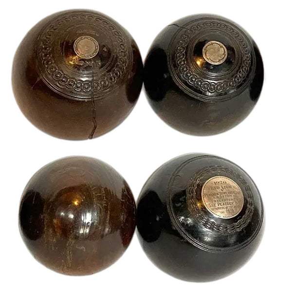Collection of Four Scottish Thomas Taylor and English Lignum Vitae Lawn Balls