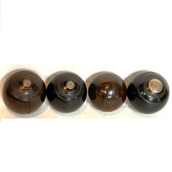 Collection of Four Scottish and English Lignum Vitae Lawn Bowls