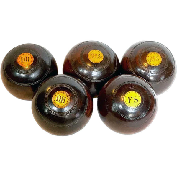 Collection of Five Large Scottish Thomas Taylor Lignum Vitae Lawn Balls