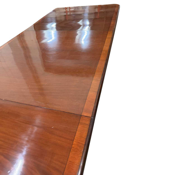English Regency Crossbanded Mahogany Triple-Pedestal Dining Table