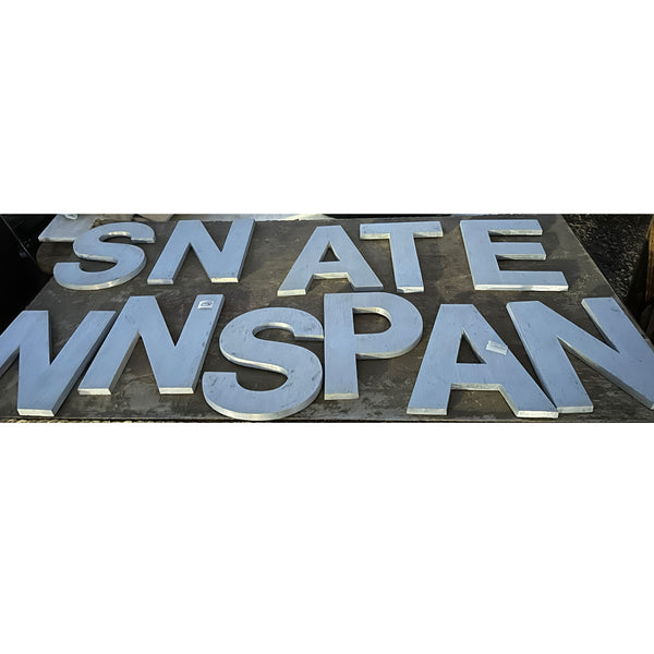 Lot 0146 | (12) Vintage American Spanjer Bros. Brushed Aluminum Letter Building Signs