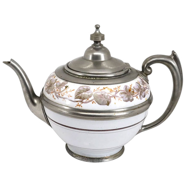 Lot 0388 | American Manning, Bowman & Co. Pewter Enamel Graniteware Tea and Coffee Pots (3 pieces)