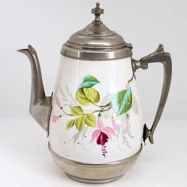 Lot 0388 | American Manning, Bowman & Co. Pewter Enamel Graniteware Tea and Coffee Pots (3 pieces)