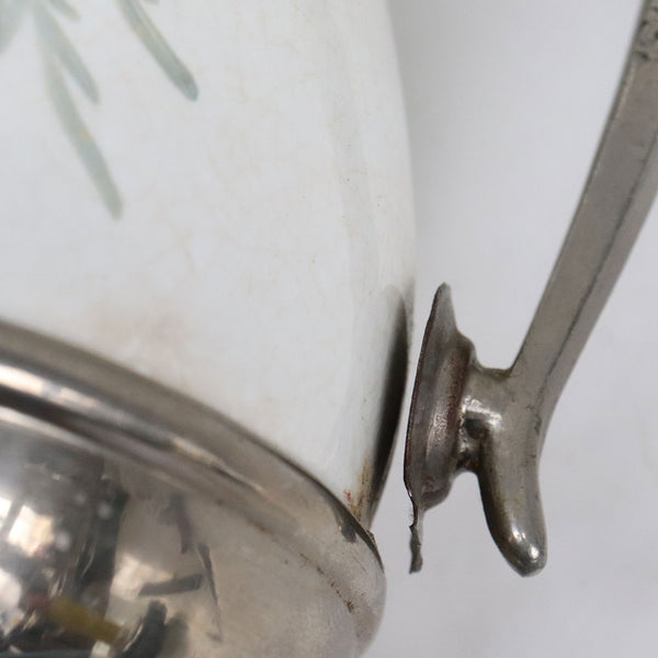 Lot 0388 | American Manning, Bowman & Co. Pewter Enamel Graniteware Tea and Coffee Pots (3 pieces)