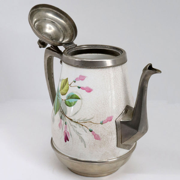 Lot 0388 | American Manning, Bowman & Co. Pewter Enamel Graniteware Tea and Coffee Pots (3 pieces)