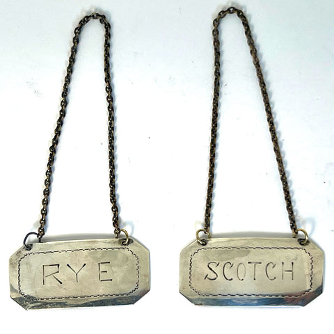 Set of Two American Sterling Silver Rye and Scotch Decanter Labels