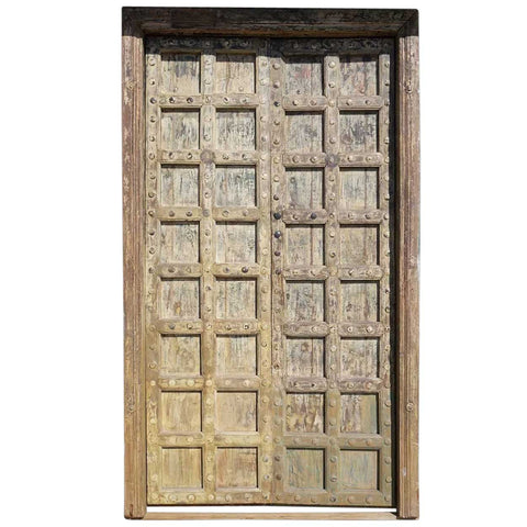 Large Indian Yellow Painted Teak and Iron Mounted (Clavos) Double Door and Jamb