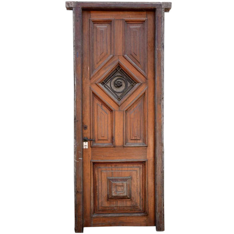 Argentine Cedro Mahogany and Wrought Iron Paneled Single Entry Door and Jamb