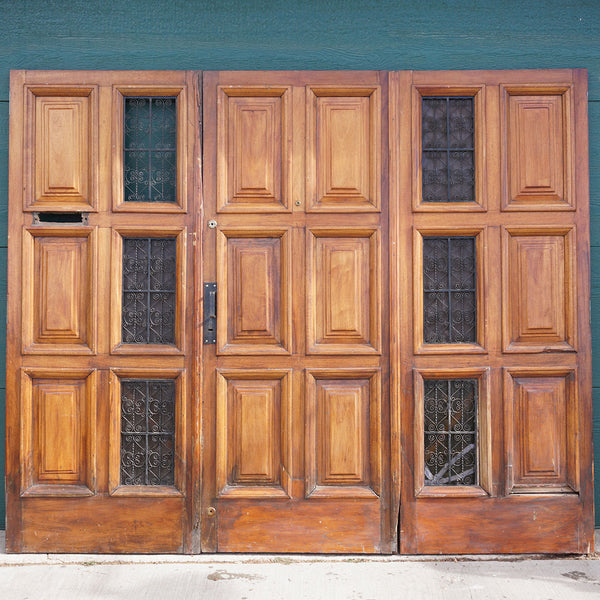 Spanish Colonial Style Paneled Walnut and Forged Iron Single Entry Door and Sidelights