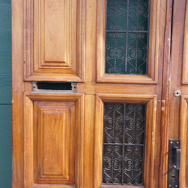 Spanish Colonial Style Paneled Walnut and Forged Iron Single Entry Door and Sidelights