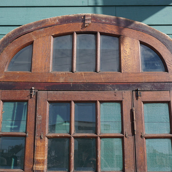 French Oak and Beveled Glass Single Door Entry, Arched Transom and Sidelights