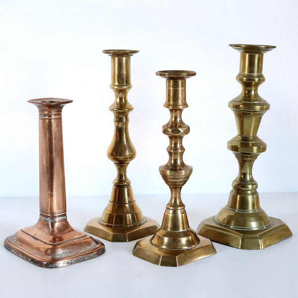 Collection of Four English Victorian Brass and Copper Candlesticks