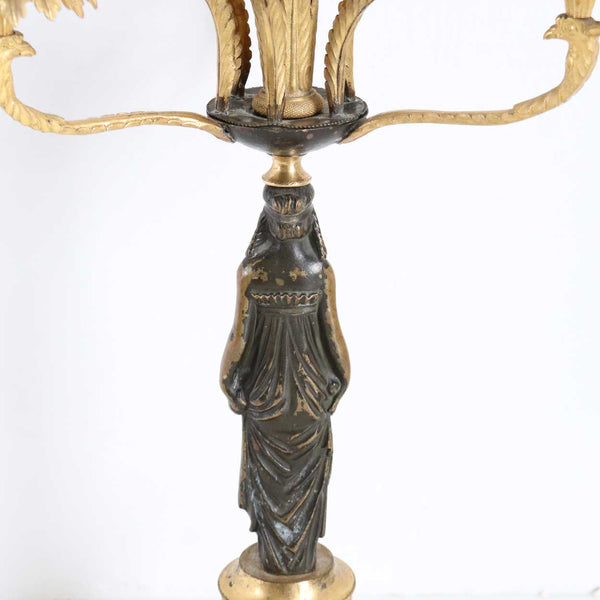 Pair of French Empire Fire Gilt and Patinated Bronze Four-Light Figural Candelabra