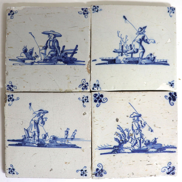 Set of Four Dutch Delft Blue and White Pottery Square Figural Tiles