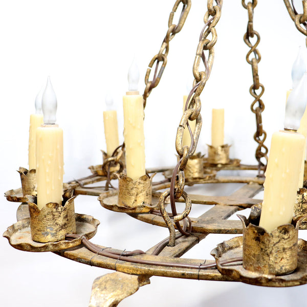 Pair of Large Medieval Style Gilt Forged Iron with Gold Finish 12-Light Chandeliers