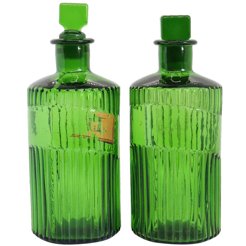 Pair of English Victorian Glass Emerald Green Fluted Apothecary Chemist Poison Bottles