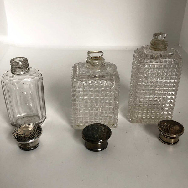 Collection of 12 American and English Sterling Silver and Glass Dresser Vanity Bottles