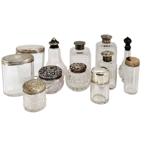 Collection of 12 American and English Sterling Silver and Glass Dresser Vanity Bottles