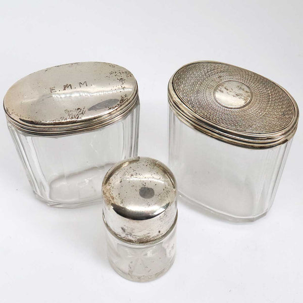 Collection of 12 American and English Sterling Silver and Glass Dresser Vanity Bottles
