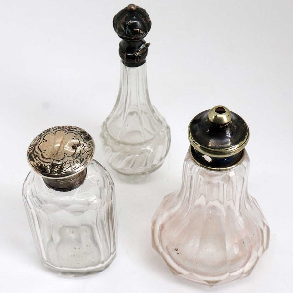 Collection of 12 American and English Sterling Silver and Glass Dresser Vanity Bottles