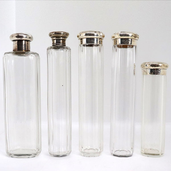 Five English and German Sterling Silver Mounted Slab Cut Glass Vanity Case Bottles