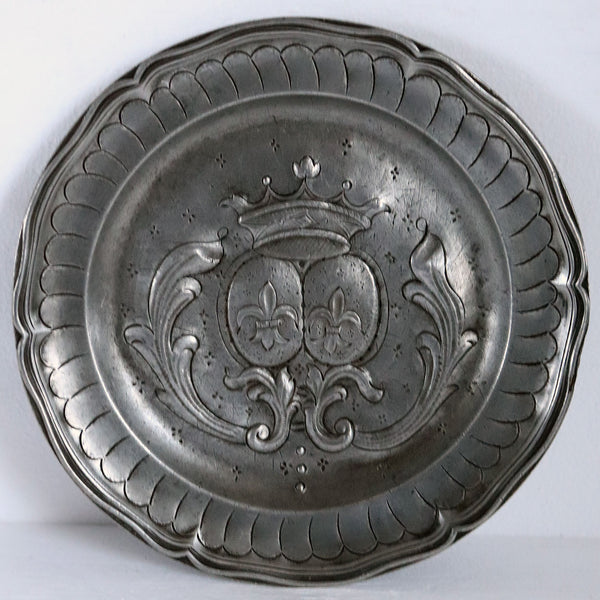French Pewter Chased and Repousse Armorial Wavy Edge Reeded Plate