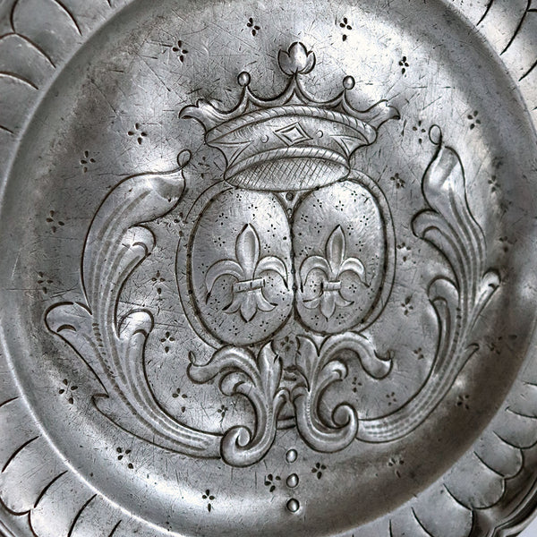 French Pewter Chased and Repousse Armorial Wavy Edge Reeded Plate