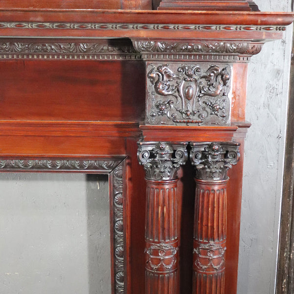 Grand American Renaissance Revival Mahogany Beveled Mirrored Trumeau Fireplace